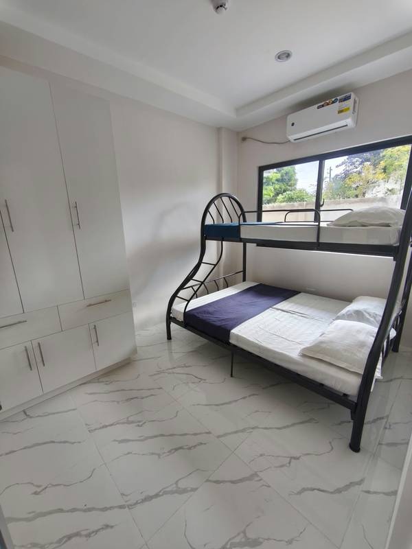 Condo bedroom with bunk bed — 2020 Housing Unit 3